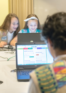 Girl Scouts Olivia and Isabella experience Digital Cookie for the first time